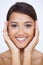 Portrait, cosmetics and woman with skincare, smile and treatment on white studio background. Face, Indian person and