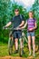 Portrait of a couple of athletes with bicycles