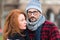 Portrait of couple. Close up of man in glasses and woman profile. Portrait of brunette woman and guy in hat.