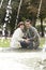 Portrait Of Couple On Fountain Edge