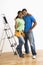 Portrait of couple with ladder.