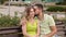 Portrait of couple in love on a bench in the Park.