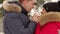 Portrait of a couple in love in the winter forest.