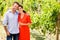 Portrait of couple standing at vineyard