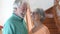 Portrait of couple of two happy and healthy seniors old people smiling and looking at the camera. Close up of mature grandparents