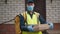 Portrait of a courier in a medical mask and gloves