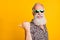 Portrait of crazy bearded old man point at copyspace reccomend promo ads feel funny funky wearing leopard shirt green