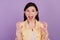 Portrait of crazy mad angry woman scream yell open mouth on violet background