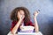 Portrait of curly hair teen girl above book