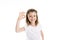 Portrait of a cute 7 years old girl Isolated over white background show positive hand