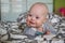 Portrait of cute baby boy with Down syndrome