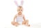 Portrait of cute baby in costume easter bunny with fluffy ears