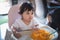 Portrait of cute baby eating dirty on the table