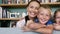 Portrait of a cute family posing and smiling