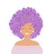 Portrait of a cute girl with hair of lilac flowers. Spring woman