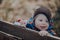 Portrait of cute infant, smiles, close up