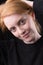 Portrait of a cute Irish redhead female. Closeup of head and face.