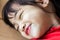 Portrait of cute Little asian girl in moment of happiness. Children sleeping and be smile.