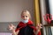 Portrait of cute Little Girl in costume of evil at home. Happy Halloween during coronavirus covid-19 pandemic quarantine concept.