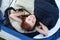 Portrait Of Cute Little Girl Lying In Tent