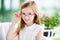 Portrait of cute little girl wearing glasses at home. Vision, health, ophthalmology concept.