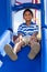 Portrait of a cute little indian boy at playground