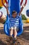 Portrait of a cute little indian boy at playground