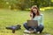 Portrait Of Cute Redhead Student Girl In Eyeglasses Studying With Laptop Outdoors