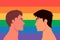 Portrait of Cute Two Young Men, Gay Couple Look at Each Other on LGBT Flag Background. Romantic Partner, Homosexual