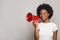 Portrait of cute woman in white t-shirt holding red loudspeaker. Leadership, attention, advertisement, broadcasting and sound