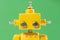 Portrait of a Cute, yellow, handmade robot
