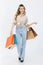 Portrait  cutout studio full body shot of Asian cheerful female clients customers shoppers in casual outfit buying holding