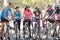 Portrait Of Cycling Club On Suburban Street