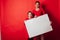 Portrait with a daughter with mother a sign for inscriptions on a red background