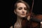 Portrait of dedicated professional woman violinist