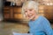 Portrait of delighted retired woman smiling