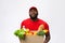 Portrait of delivery african american man in red shirt. he lifting heavy weight grocery boxes against having a isolated