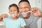 Portrait of dental dad, kid brushing teeth and healthy mouth cleaning in home bathroom. Happy father teaching child oral