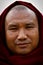 Portrait of a devotee at Mahabodhi Temple in Bodh Gaya, India