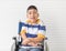 Portrait of disable kid boy on wheelchair with happy smile face