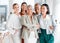 Portrait, diversity and business women support, teamwork and group empowerment for office leadership. Career hug and