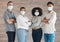 Portrait of diversity team with mask for covid safety, health or protection from bacteria, virus or covid 19. A group of