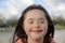 Portrait of down syndrome girl smiling