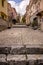 Portrait down up view of main cobblestone street in old city.City of Bakar, Croatia.