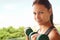 Portrait, dumbbell and woman outdoor for workout, training or exercise for power in nature. Face, strong and person