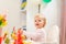 Portrait of eat smeared kid eating birthday cake