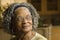 Portrait of an elderly African American woman at home.