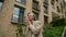 Portrait of an elderly caucasian business woman outdoors. Video 360 degrees.