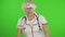 Portrait of elderly caucasian female doctor. Crazy and funny nurse