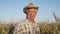 Portrait Elderly Man Farmer With Hat On Agricultural Field Wheat